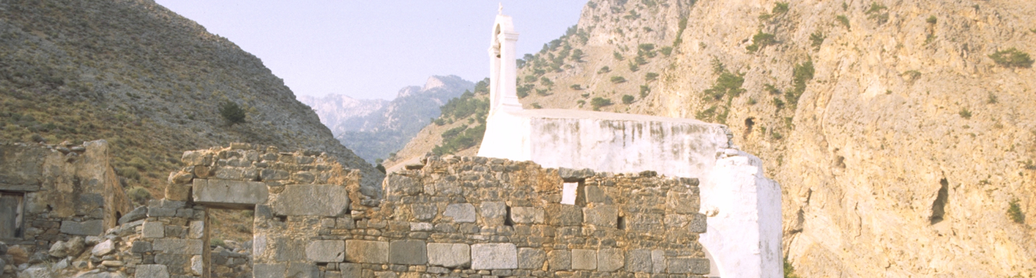 Stacked sanctuaries at the mouth of the Samaria Gorge, Sphakia, Crete: Classical temples, Late Roman basilica, Venetian-period church. Photo: O. Rackham, July 1987.