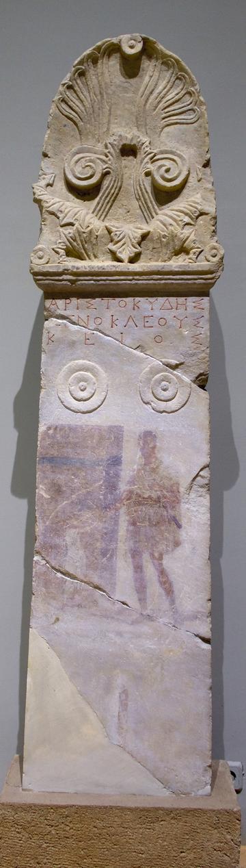 painted stele with palm motif on the top