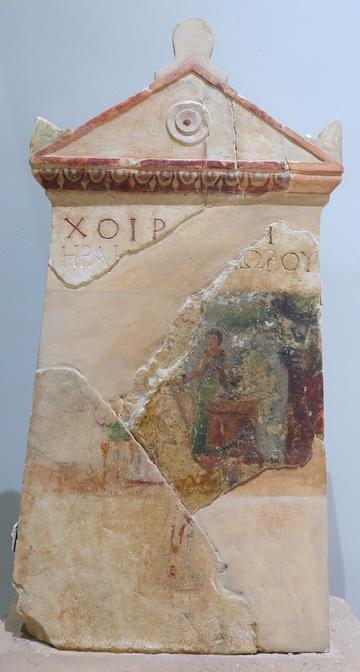 Painted stele with reconstruction